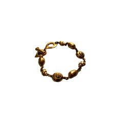 YVES SAINT LAURENT  gilt sea shell bracelet