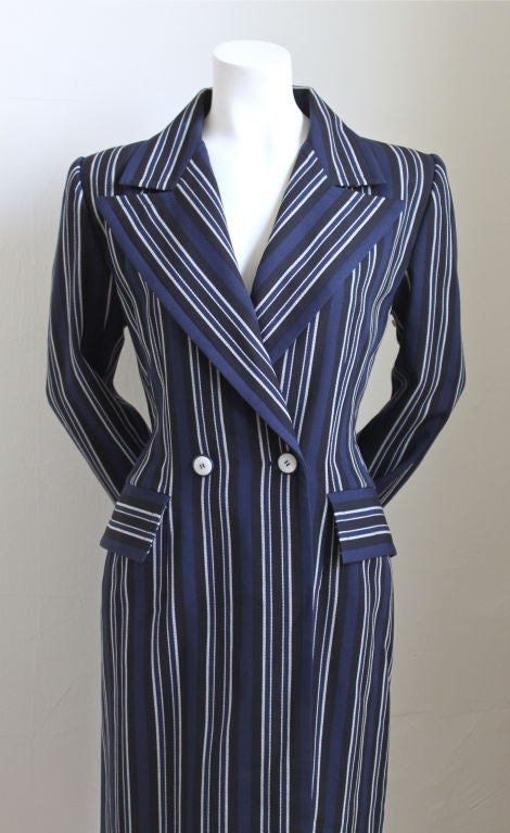 Boldly striped knee length coat from Givenchy Nouvelle Boutique dating to the 1980's. Numbered. French size 38, although this fits a US 8 or possibly a 10. Pockets at hips. Fully lined. Made in France. Excellent condition.