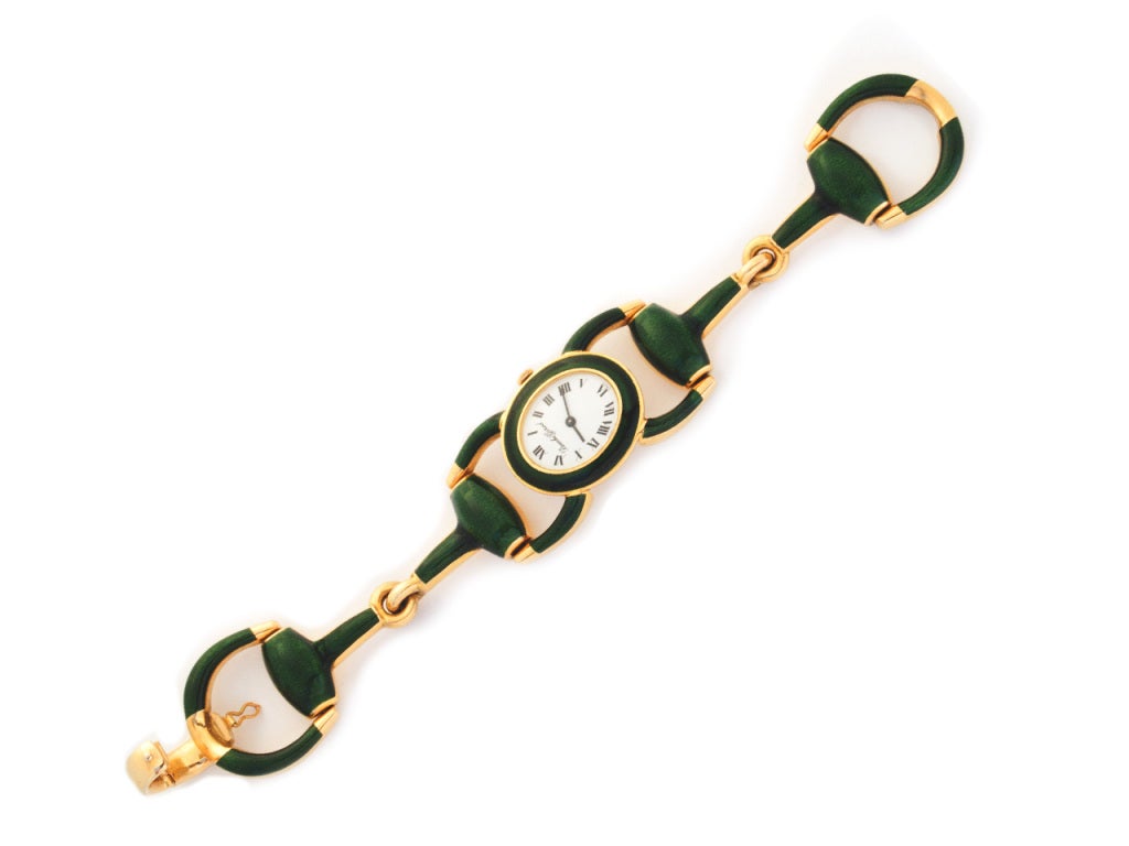 Bueche-Girod 18k yellow gold and green enamel stirrup lady's bracelet watch, with manual-wind movement in working condition.. 7-1/4 