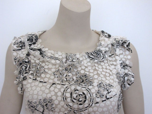 Chanel white silk ruffle hem mini dress with allover stitched black & white camellia print 