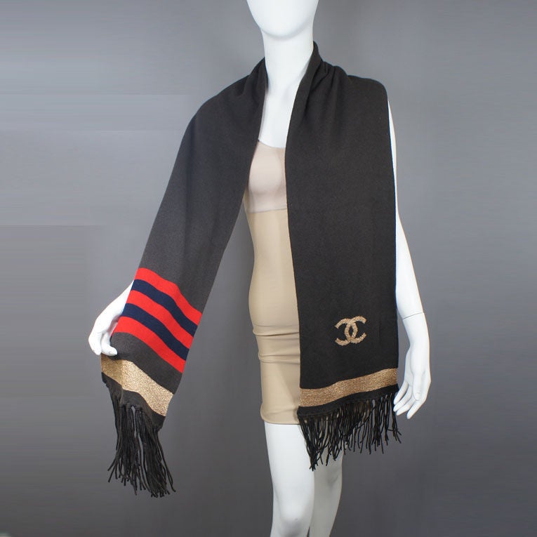 CHANEL icon muffler scarf in brown cashmere with gold, red and navy and accents from 09A. Scarf has 6