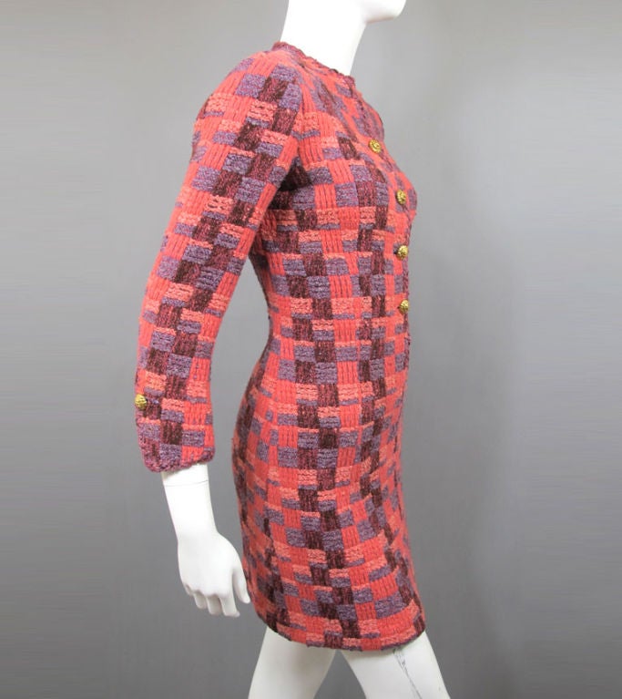 CHANEL vintage (circa late 1980s-early 1990s) haute couture numbered two-piece pink and purple wool plaid coatdress with gold metal lionhead buttons.  The top has a round neckline, four gold lionhead buttons close and bracelet sleeves with one