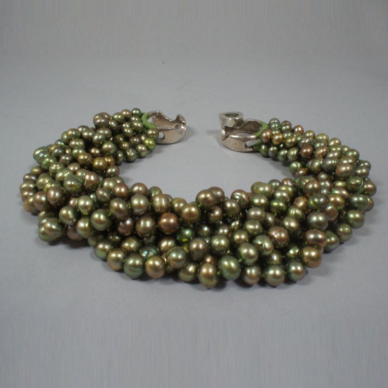 Patricia Von Musulin 8 Strand Dyed Green Baroque Pearl Torsade Necklace. This one of a kind necklace is believed to have been dyed with green tea, and is the only one of its kind with eight strands of pearls (others have four) and hand dyed color.