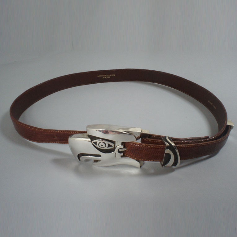 Kieselstein-Cord mahogany(brown) lizard belt with large sterling silver eagle head buckle. A classic Kieselstein-Cord motif, the belt is genuine lizard is stamped 'Barry Kieselstein-Cord' and 'E'. The end has a sterling silver tip, stamped on the