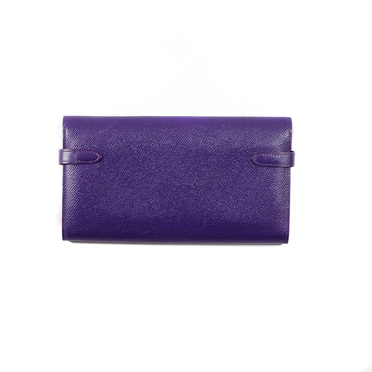 Hermes Kelly long wallet Iris (purple) in Epsom leather with signature palladium hardware. Blindstamp: N in a square (circa 2010). Features 6 credit card/ID slots on the front and the back along with a miscellaneous pocket on each wall (perfect for