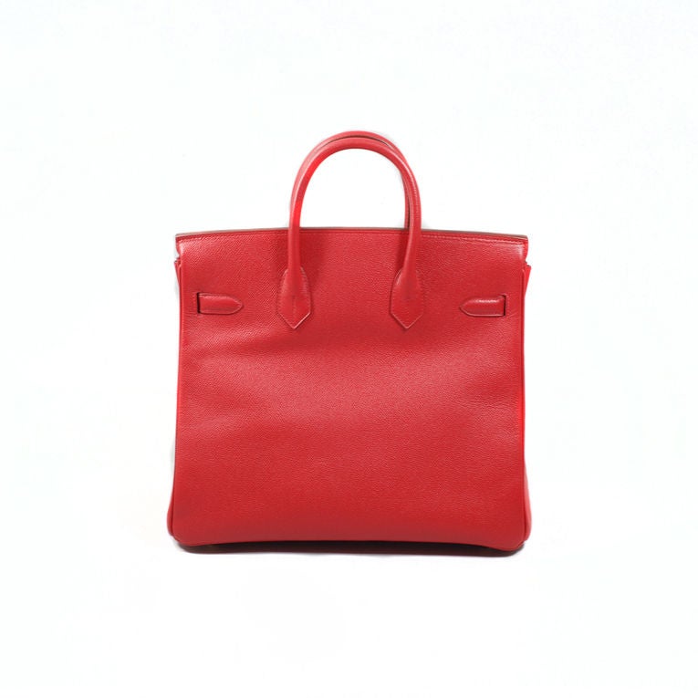 Hermès Rouge Vif 32cm HAC Birkin in epsom leather with shiny gold hardware, matching strap, clochette, lock (2 keys). Stamped G in a square (circa 2003). The bag is preowned and never carried with the plastic still on the front hardware. Interior is