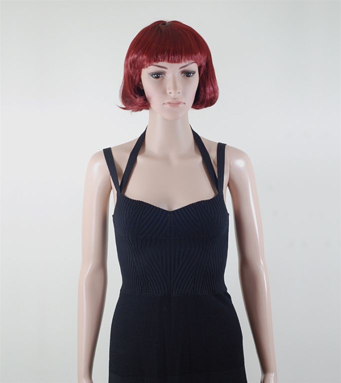 CHANEL 08P black knit body-con halter dress having a chevron pattern at the bodice.  Absolutely timeless Chanel knit dress with double straps, sweetheart neckline, defined waist, a-line skirt and scalloped trim. <br />
 <br />
Mint condition.