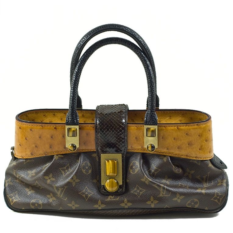 Louis Vuitton limited edition Macha Waltz ostrich monogram bag.  This limited edition bag features the classic Louis Vuitton monogram canvas.  The top portion of the bag is ostrich; the bottom is calfskin, and the hand straps, closure strap, and