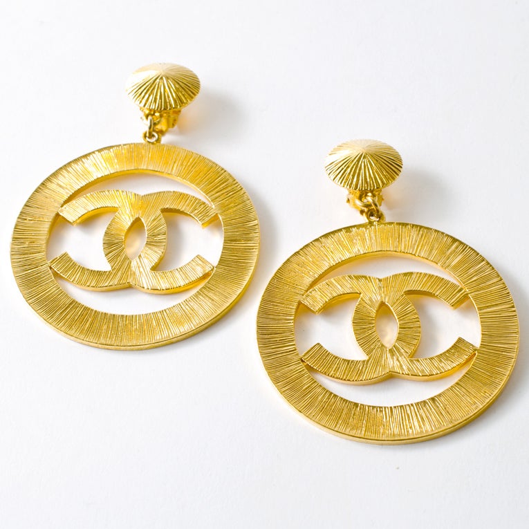 Chanel CC Sunburst Icon Hoop Logo Earrings Gold Lady Gaga