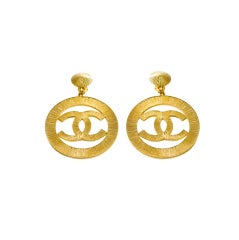 Chanel CC Sunburst Icon Hoop Logo Earrings Gold Lady Gaga