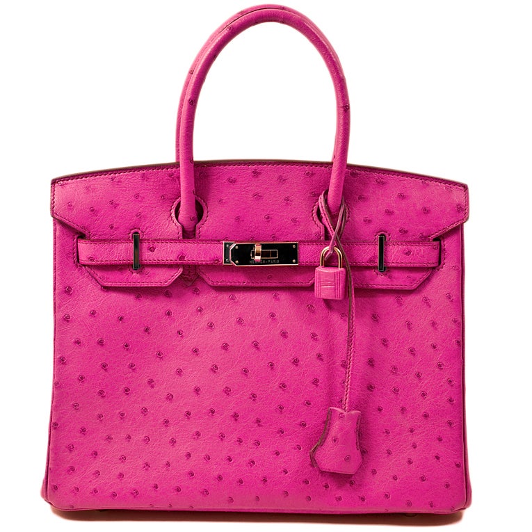 Hermes 30cm Birkin handbag in exotic fuchsia ostrich skin with palladium hardware

This bright and versatile bag is in excellent condition--plastic on three of the four feet hardware, blindstamp J in a square (2006)

Interior is lined in chevre