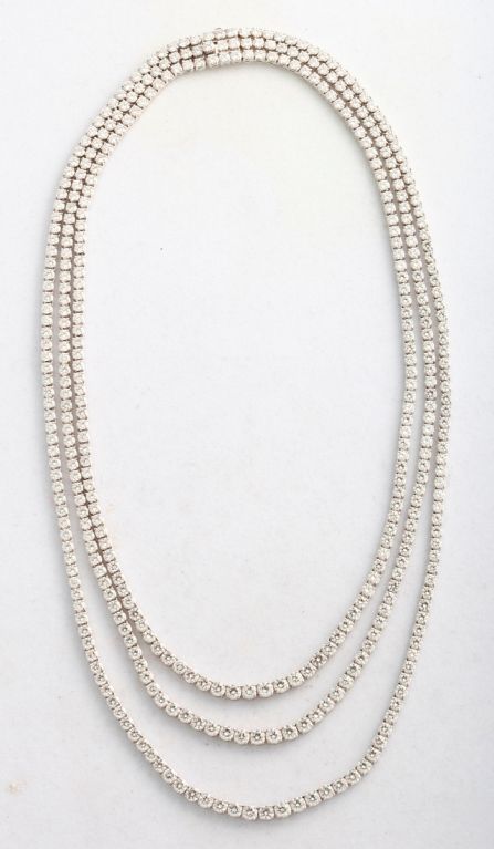Flexible and elegant 18K White Gold Three Strand Diamond link Necklace with over 29.00 tw in Diamonds. G Color, VS2 - SI1
