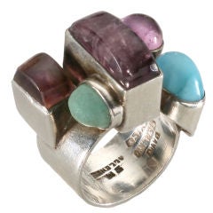 Mexican silver abstract ring with semiprecious stones.