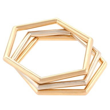 Christian Dior:: milieu du 20e siècle:: ensemble de 3 bracelets-bracelets hexagonaux en or