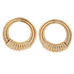 Van Cleef 
Arpels Diamond and Gold Hoops
