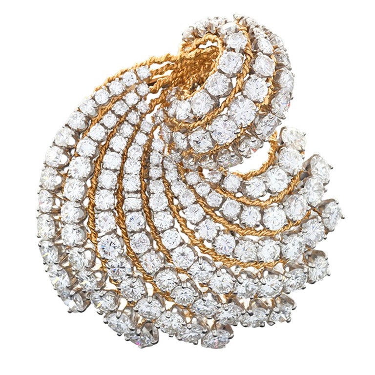 Van Cleef & Arpels Mid-20th Century Diamond and Gold Platinum 'Swirl' Brooch