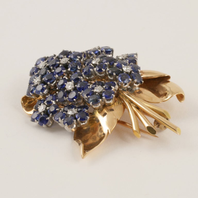 Retro Flower Bouquet Diamond and Sapphire Brooch In Excellent Condition In New York, NY