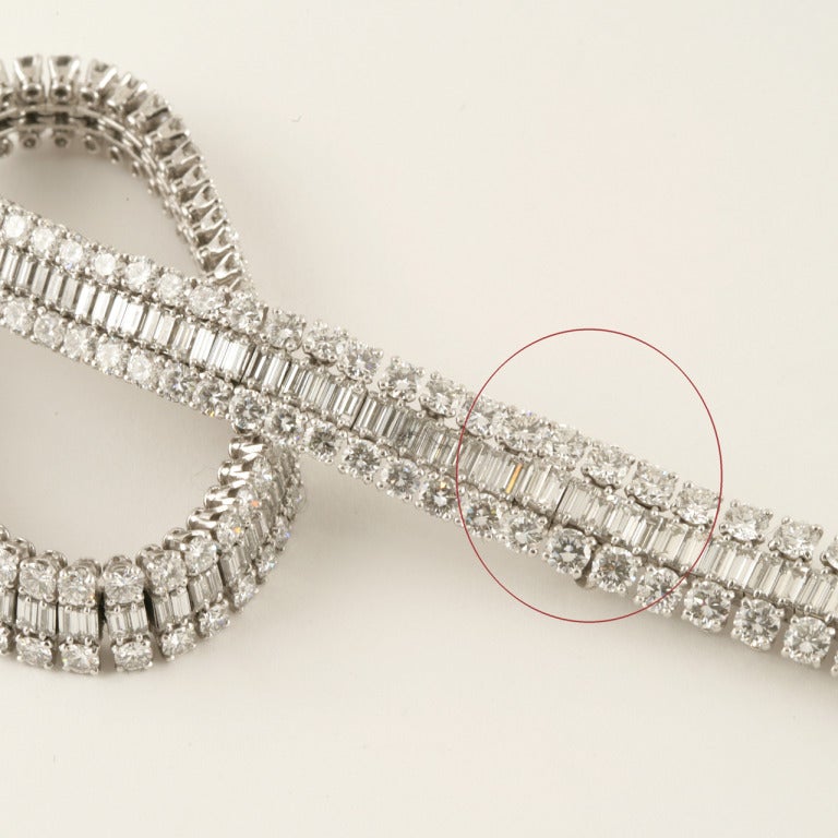 A creation of French jewelers serving royalty since the early 17th century, this superb triple-row necklace of near-colorless diamonds and platinum is a mid-century modernist version of the traditional rivière. Here, Mellerio dit Meller designers