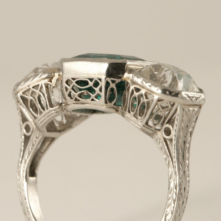 Women's Art Deco Emerald Diamond Platinum Three Stone Ring