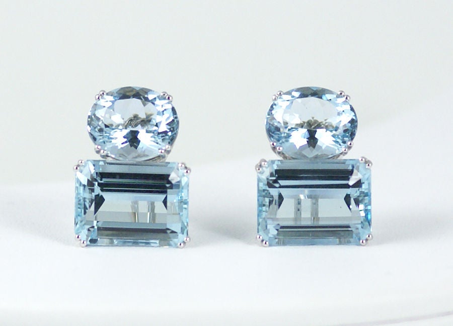 Emerald Cut Aquamarines Paired with Oval Aquamarines make an impact. In 18KW Gold. Clips.