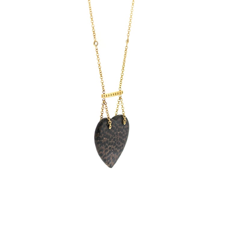 Rare natural textured Palmwood heart is pierced with Diamonds and suspends from a Diamond 18KY Gold cable chain, closed with a lobster clasp.