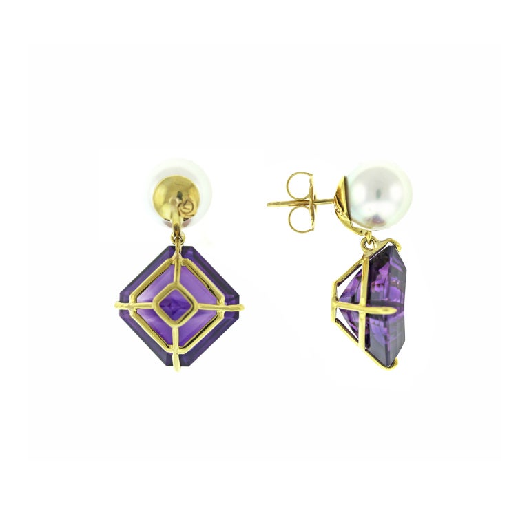 Asscher Cut Intense Amethyst Claw set in 18KY Gold suspended from natural color white South Sea Pearls.