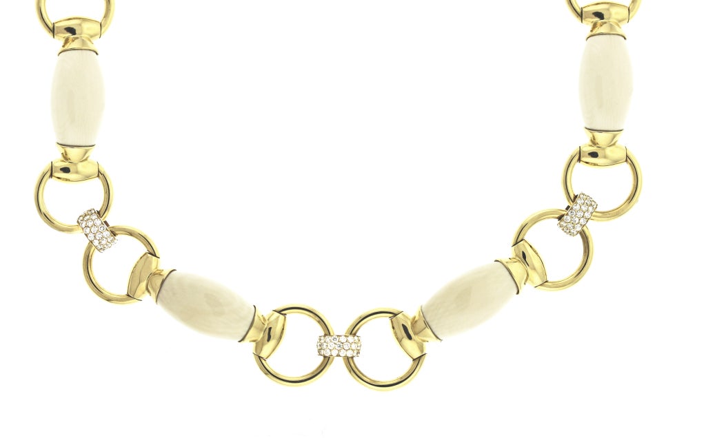 Solid Mammoth Ivory and Diamond linked in 18K yellow gold with an invisible clasp. 16