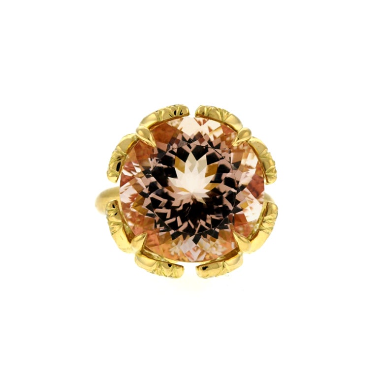 Rich cognac color round Tourmaline set in signature Donna Vock Cocktail diamond ring. Size 6. Can be sized. 13.8mm= height of entire setting atop gold band. Stamped Donna Vock.