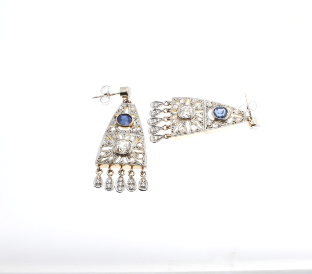 Chic  Deco Earrings with 23 round diamond 1 sapphire in the center two tone 2 inches long and 3/4 inch width.  Platinum top with gold back.