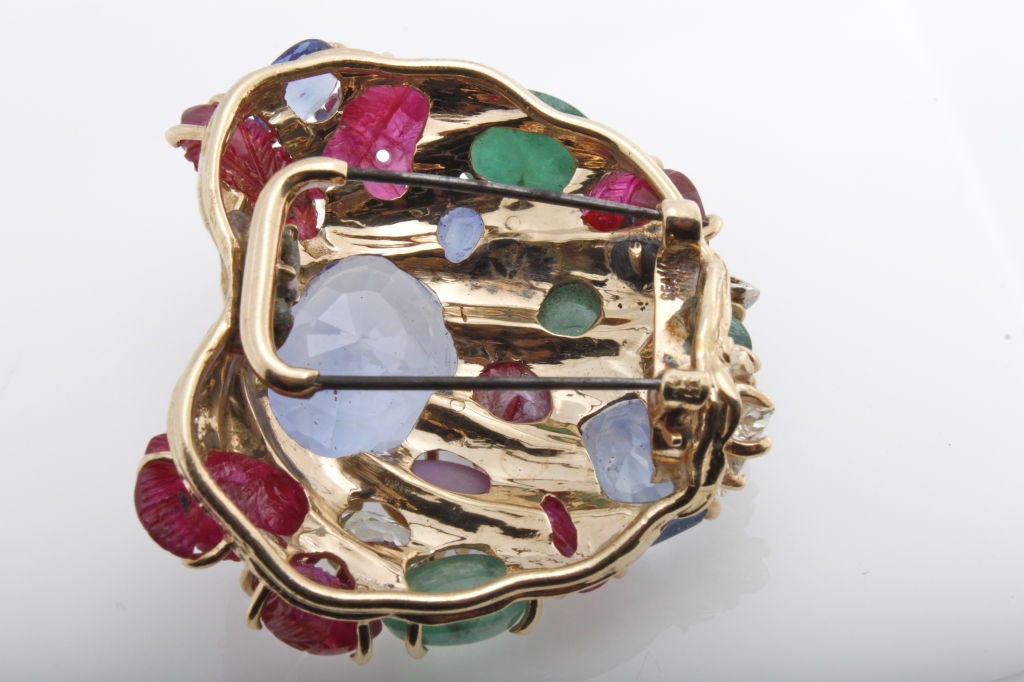 18 Karat gold, platinum, sapphire, ruby, emerald and diamond brooch, Seaman Schepps, circa 1940s.  Signed Seaman Schepps.
