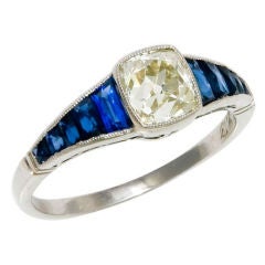 Antique Platinum Cushion cut Diamond and Sapphire Ring