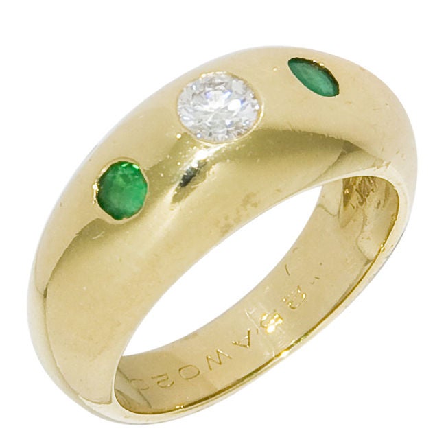 Signed and Numbered 3 stone Diamond and emerald Ring by Cartier, Diamond = .25 Carat, Finger size = 6