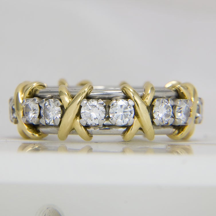 Jean Schlumberger for Tiffany X Love ring in Platinum, 18K Yellow Gold and Diamonds, 16 Diamonds total 1.18 Carat G Color VS Clarity, Finger size = 4 1/2 original Retail $6950.00