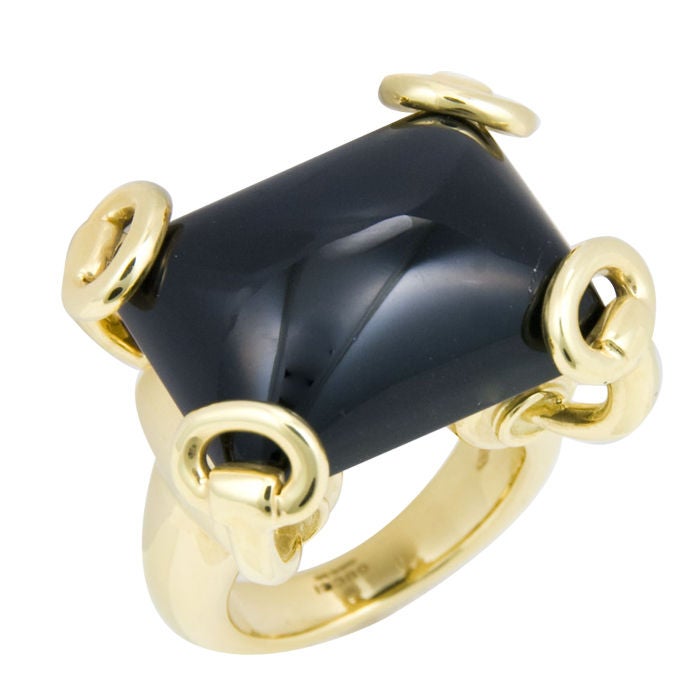 Large and impressive ring by Gucci in 18K Yellow gold and Black Onyx.This ring is new never worn with original Box, finger size= 5 1/4