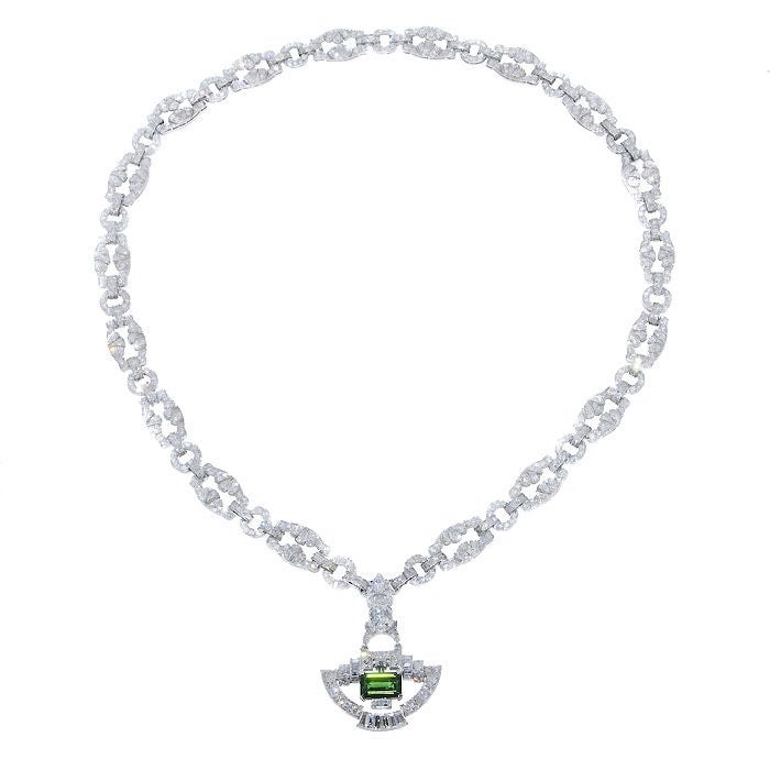 Impressive Art Deco French hallmarked period Necklace that breaks down into three 7 1/4 inch Bracelets. Set with 21 carats of single and old european Cut Diamonds and a step cut Tourmaline. A similar Necklace with identical clasps appears in The