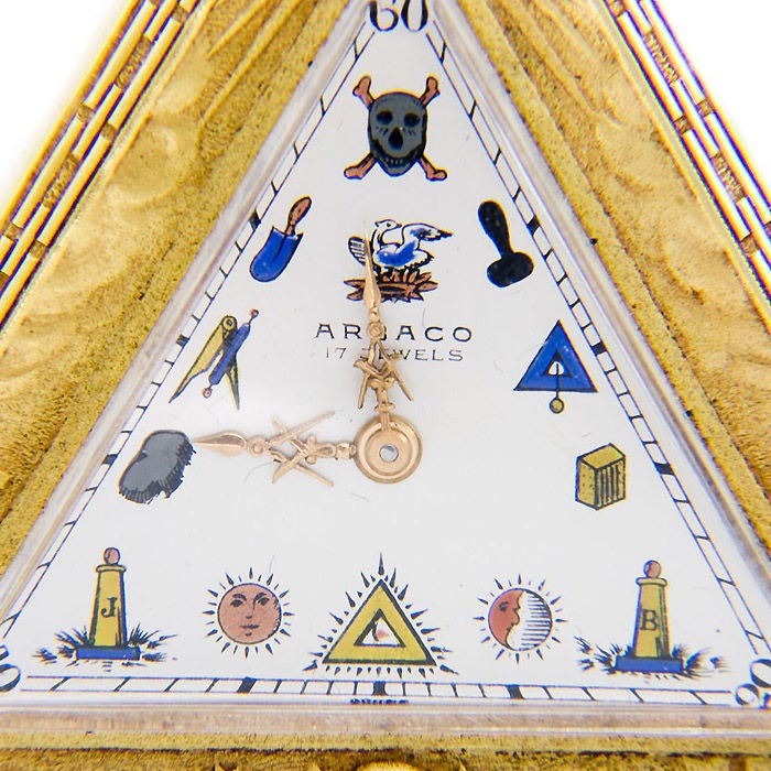 Circa 1940s Gold Filled Masonic Pocket watch, Printed metal Dial with Masonic symbols and Cut out Masonic Symbol hands. Nicely detailed High relief Case, 17 jewel Swiss manual wind movement. With original Boxes.