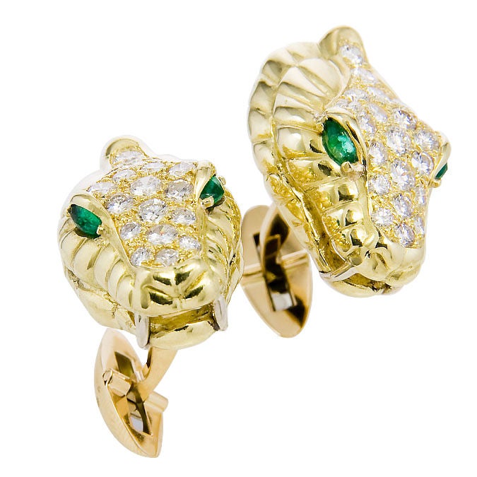 Very Detailed 18K Yellow Gold Serpent Head Cuff Links, set with <br />
3 Carats of fine white Brilliant cut Diamonds and Emerald Eyes.