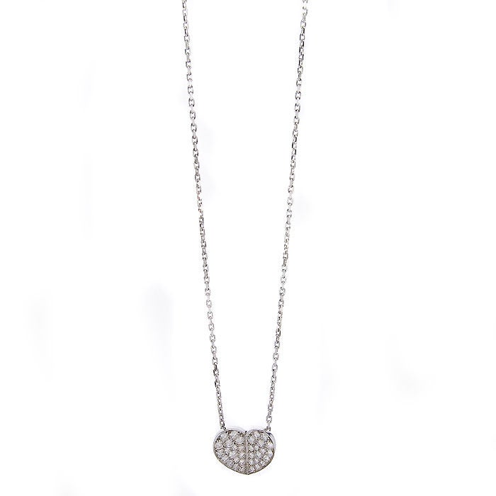 18K White Gold and Diamond Heart pendant by Van Cleef & Arpels. set with 1 Carat of Fine White Brilliant cut Diamonds, Signed and Numbered.