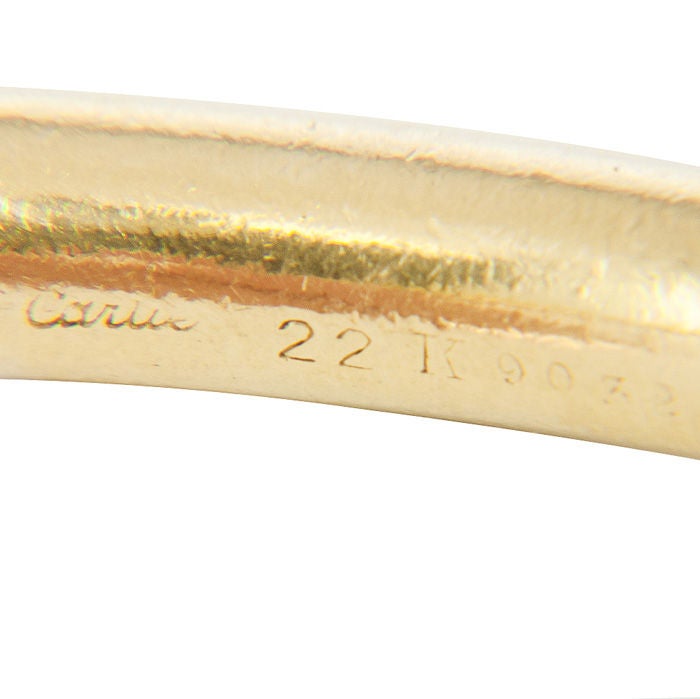 Unusual Cartier, signed and Numbered 22K Yellow Gold, Solid Round, Bangle Bracelet.