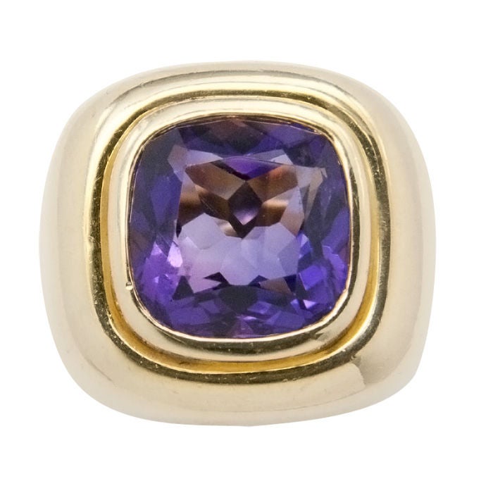 Large and Bold 18K Yellow Gold ring by Paloma Picasso for Tiffany & Company,Fine Color Cushion shape Amethyst of approximately 8 Carats, finger size = 5 1/2.