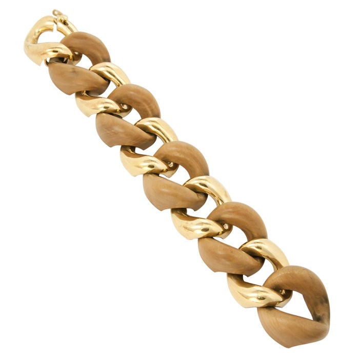 Large and Bold 18K Yellow gold and Wood link Bracelet by Seaman Schepps,signed and numbered in original presentation box.