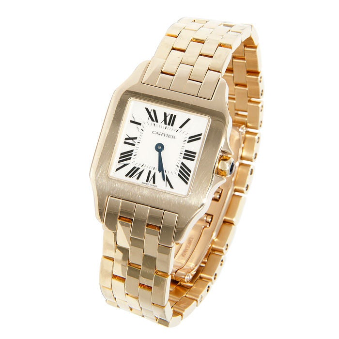 Cartier 18k yellow Gold Mid size Santos Demoiselle, Quartz Movement, comes with Box and Booklets.