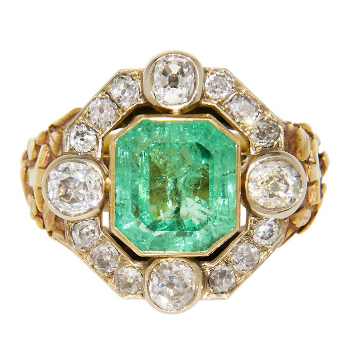 Large and Impressive Bishops Ring, 18K yellow Gold set with old Mine Cut Diamonds totaling 4 carats. and centrally set with a step cut Emerald weighing 6 carats.Finger size = 14, comes in original box from Mancini & Lefevre, Rome. This ring has been