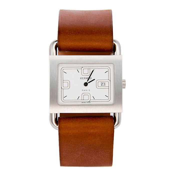 Hermes Barenia steel Unisex Wrist watch, Quartz with Calendar at 3 position, leather strap, this watch is like new and was never worn. Comes with Inside and outside box, warranty and instruction papers.