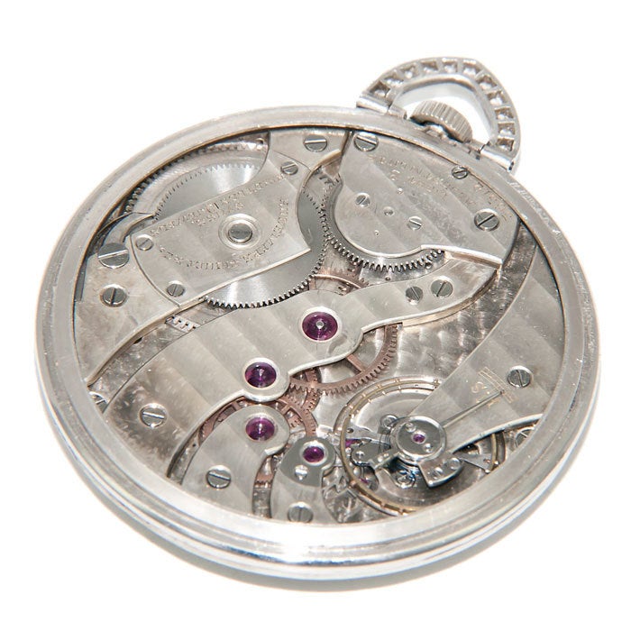 Platinum and Diamond set Pocket watch by Audemars Piguet, Contract case set with 46 fine White .05 carat Diamonds for a total of 2.30 carats and an additional .20 carats of Diamonds set in the Bow. White dial with Raised Gold Breguet Numbers and