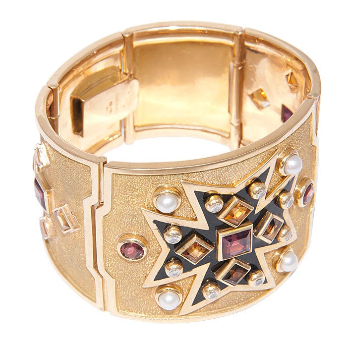 The Famous Verdura Maltese cross Bracelet, 18K Yellow Textured Gold, Black Enamel, Pearls, Diamonds, Citrine and Tourmaline. 1 5/8 Inch at its widest section. $58,500 current retail price new from Verdura
