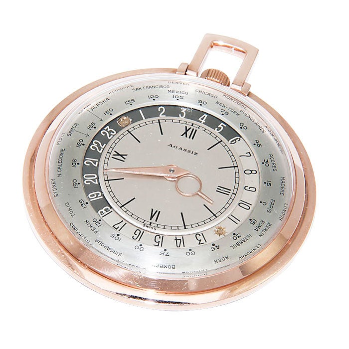 Very Rare 14K Rose Gold World Time Pocket watch by Agassiz. 45mm case, manual wind movement, all original and in excellent condition.

This model was designed by famed watchmaker and inventor Louis Cottier who worked with many of the finest Swiss