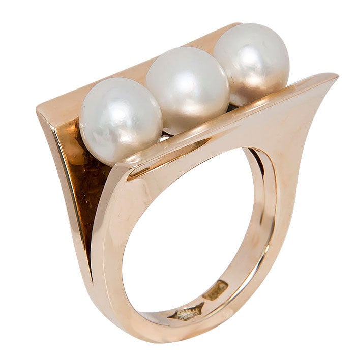 Large and Bold 14K yellow Gold Ring by Antonio Pineda, set with three 8.2 M.M. Cultured pearls. Very Rare to find jewelry in Gold by Pineda as he as many of the Taxco Craftsmen worked mostly in Silver.  Finger size = 9