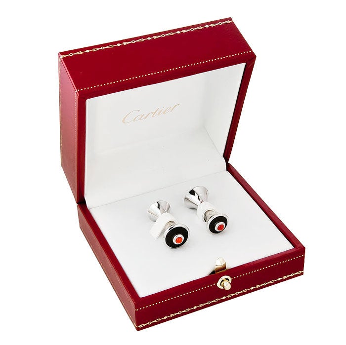Cartier, Sterling silver, Onyx and Coral Cufflinks from the Diabolo De Cartier Collection. Signed and Numbered and in the original Presentation box.