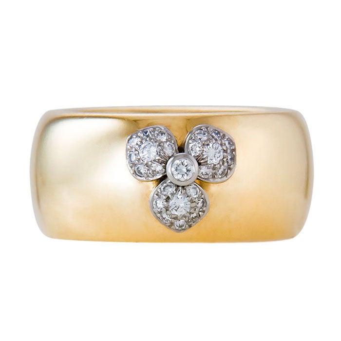Tiffany & Company 18K Yellow Gold and Diamond set, wide band Ring from the Petals Collection. Platinum Flower Top with Round Brilliant cut Diamonds. Finger size = 6
